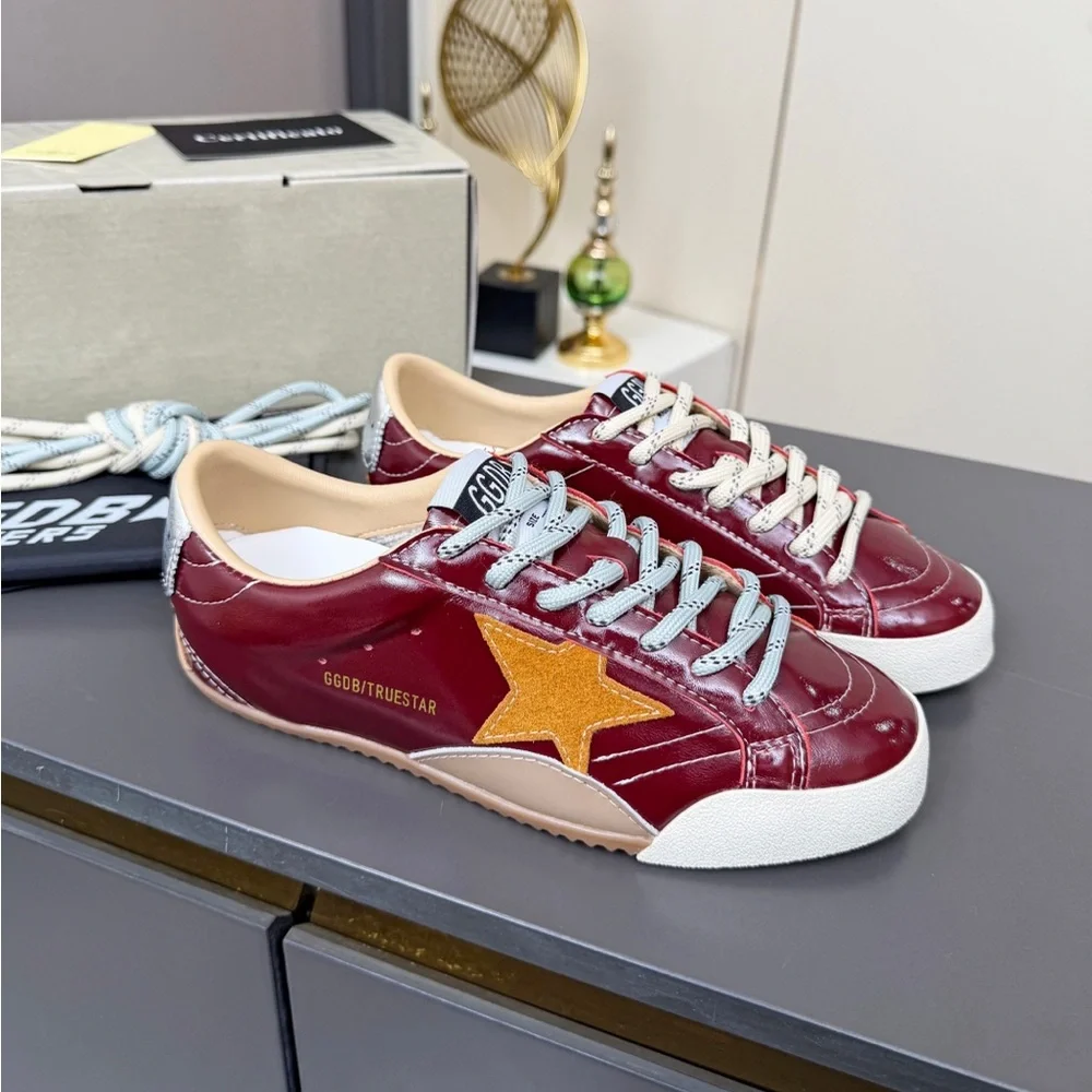 Golden Goose Women's Burgundy Leather Low-Top Sneakers with White Soles